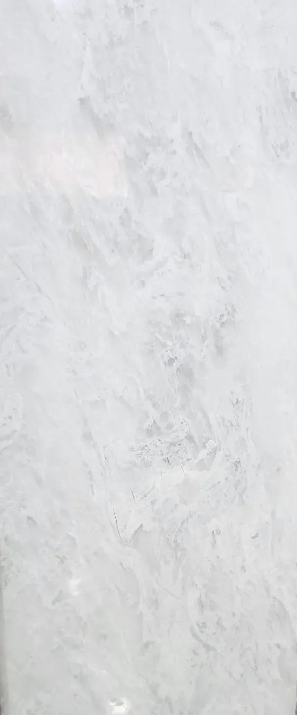 Polished slab of Cheetah White marble