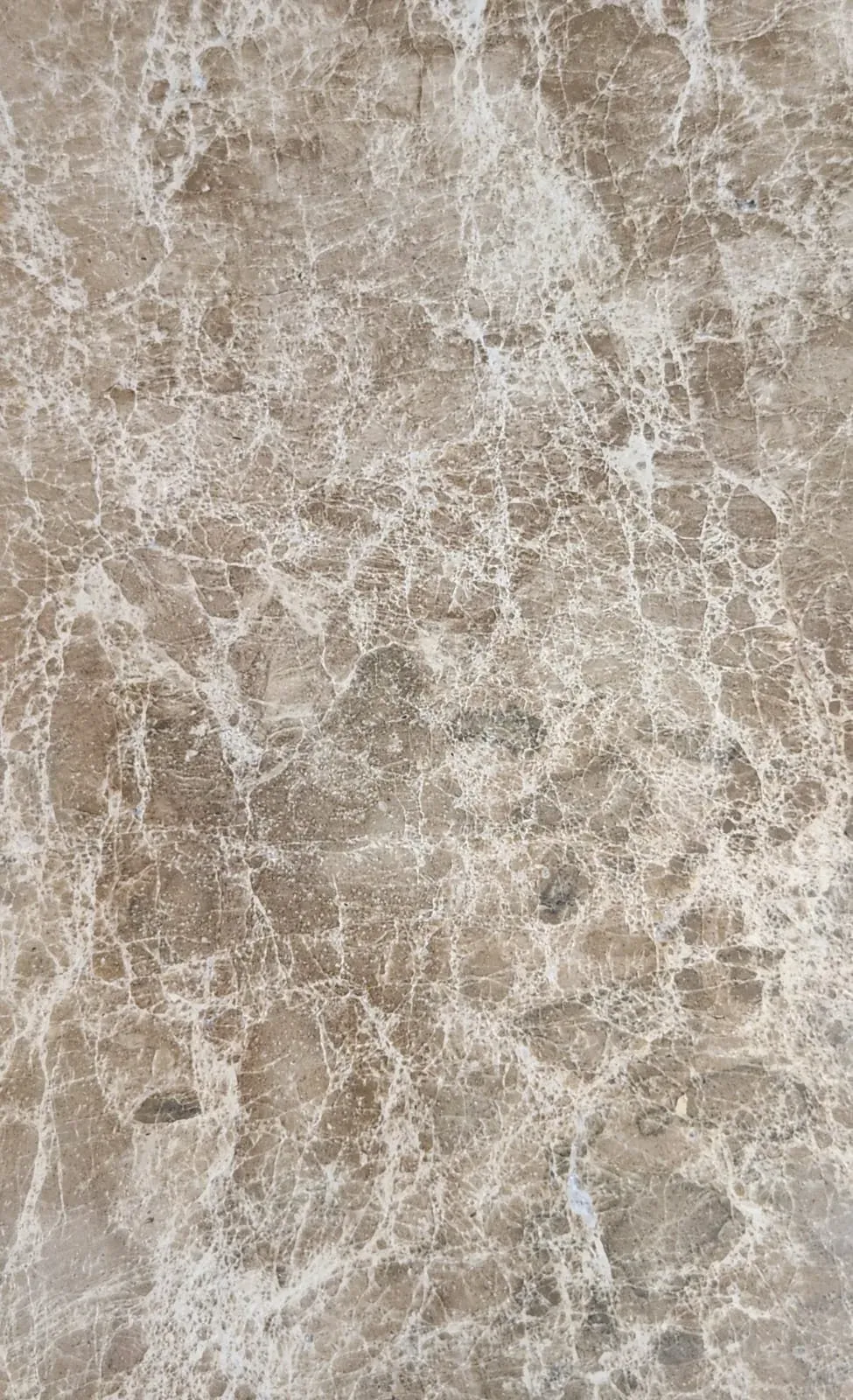 Polished slab of Emperador Light marble in brown tones